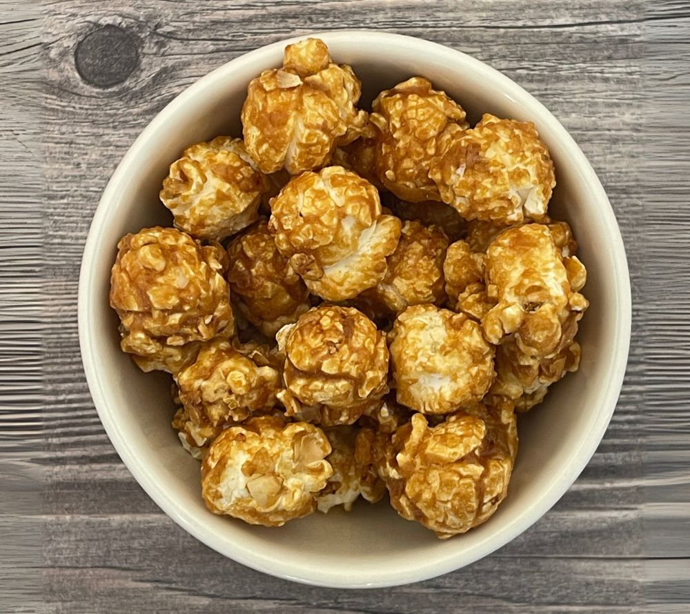 Everly Grace Popcorn Cinnamon Apple Crunch kaufen | Süßes Karamell, knackige Äpfel und feiner Zimt vereint | Ideal als Snack oder Geschenk
