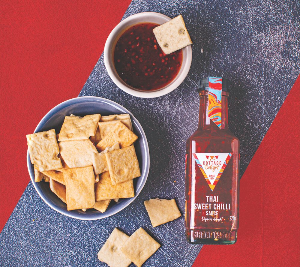 Flasche Thai Sweet Chilli Sauce von Cottage Delight mit süß-würzigem Geschmack aus Chili, Knoblauch und Limette, ideal für Dips, Bowls und asiatische Gerichte