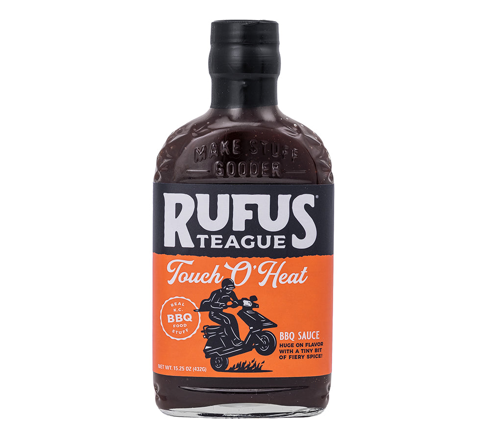 Entdecke Rufus Teague Touch O’ Heat BBQ Sauce mit intensivem Aroma und einer kleinen Portion feuriger Schärfe. Perfekt für alle, die es würzig mögen.